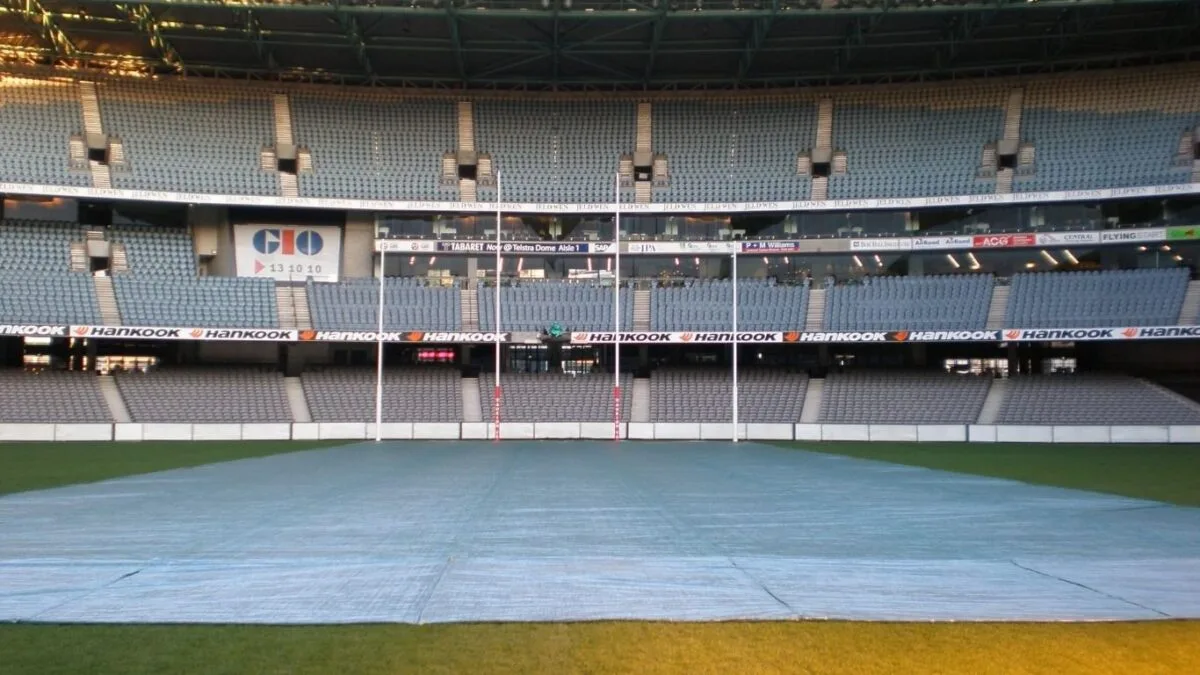 A stadium with a turf cover over the grass